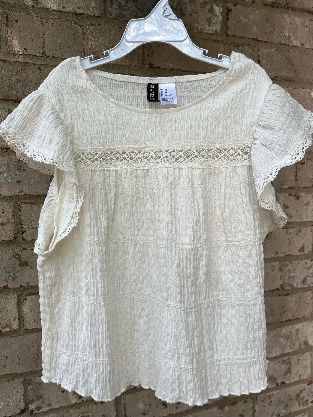 Ivory Lace-Trim Flutter Sleeve Blouse DIVIDED